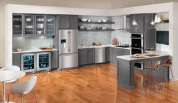 White Kitchen With Gray Refrigerator Photo