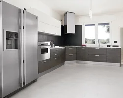 White kitchen with gray refrigerator photo