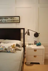 Nightstands near the bed in the bedroom photo