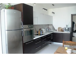 Kitchen design with pencil case and refrigerator photo