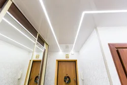 Light lines on the ceiling in the hallway photo