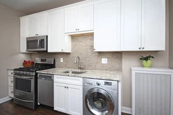 Kitchen with vertical washing machine photo