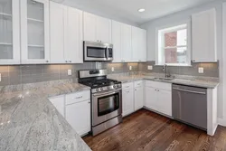 Countertop for white glossy kitchen photo