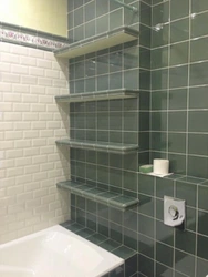 Design of shelves in the bathroom made of tiles photo