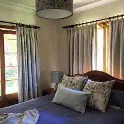 Bedroom window design with one curtain