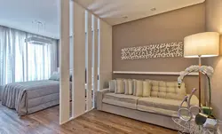 Fence off a sleeping area in a one-room apartment photo