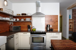 Kitchen design with wooden splashback