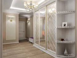 Modern sliding wardrobe in the hallway with a mirror photo design