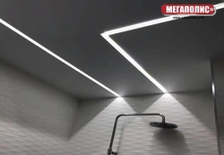 Light lines on a suspended ceiling in the bathroom photo