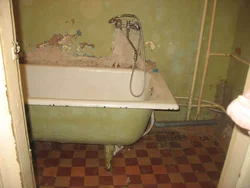 Old bathtub in the apartment photo