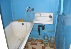 Old bathtub in the apartment photo