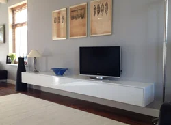 Long modern TV stand photo in the living room interior