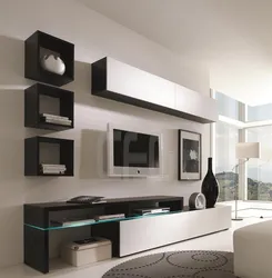 Modern Shelves On The Wall In The Living Room Interior With TV