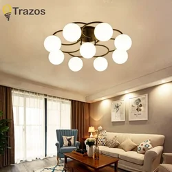 Chandelier In The Living Room On A Suspended Ceiling In A Modern Style Photo