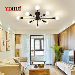 Chandelier in the living room on a suspended ceiling in a modern style photo