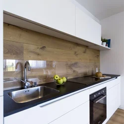 Laminate instead of an apron in the kitchen photo