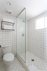 Bath white tiles black grout photo