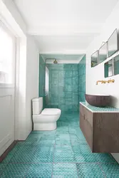 The Floor And Walls In The Bathroom Are The Same Color Photo