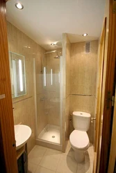 Bathroom with shower in a country house in a wooden house photo