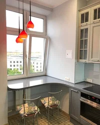 Small kitchen design with window sill