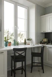 Small kitchen design with window sill