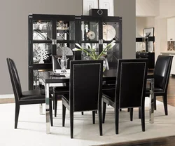 White Table With Black Chairs In The Kitchen Interior