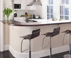 Modern Kitchens With A Breakfast Bar And A Window Photo