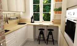 Kitchen design with a table by the window photo