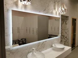 Bathroom mirror with lighting photo in the interior