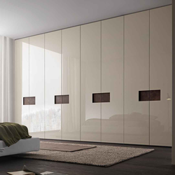 Photo of wall-sized modern bedroom wardrobes