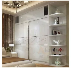 Photo of wall-sized modern bedroom wardrobes