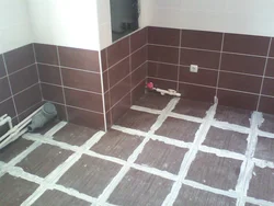 Tiles on the bathtub floor photo