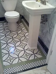 Tiles on the bathtub floor photo