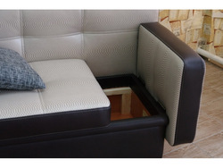 Small sofa with sleeping place in the room photo