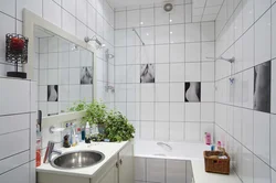 Bath white tiles with colored grout photo