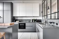 Kitchen in white and gray tones in a modern style photo