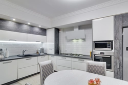 Kitchen in white and gray tones in a modern style photo