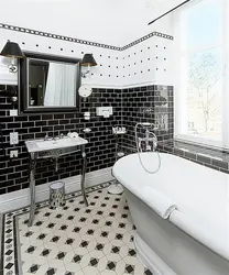 Bath design with black and white floor