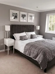 Bedroom Interior With Gray Wallpaper And Brown Furniture