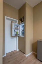 Hide the refrigerator in the kitchen photo