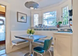 Table in the kitchen by the window interior design
