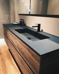 Black countertop in the bathroom photo
