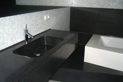 Black Countertop In The Bathroom Photo