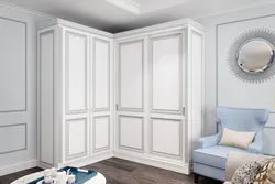 Wardrobe in the living room in a classic style for clothes photo