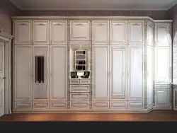 Wardrobe in the living room in a classic style for clothes photo