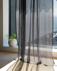 Mesh curtains in the kitchen interior