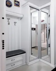 Hallway wardrobe with seat and mirror photo