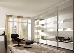 Wardrobe design in living room with mirror