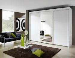 Wardrobe Design In Living Room With Mirror