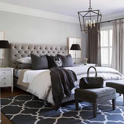 Bedroom design with gray bed and gray curtains